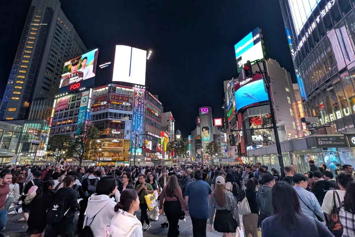 Shibuya Scramble Crossing illuminated at night